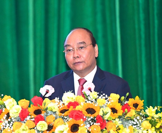 Chủ tịch nước Nguyễn Xuân Phúc: Bộ Tư lệnh TPHCM xây dựng khu vực phòng thủ vững chắc, gắn kết thân thiện với đồng bào ảnh 1