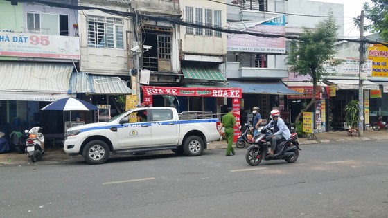 Điều tra làm rõ vụ nghi phóng hỏa đốt tiệm sửa xe ở quận Tân Bình  ảnh 1