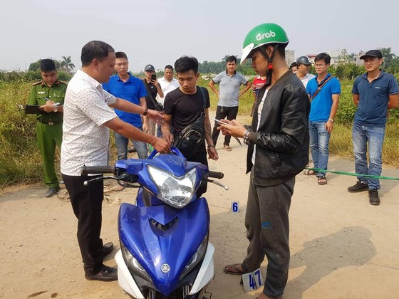 Dựng lại hiện trường hai nghi phạm sát hại tài xế Grab ảnh 5