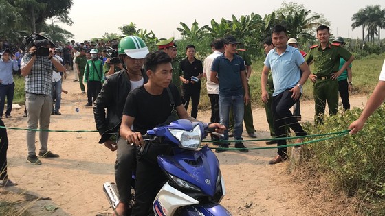 Dựng lại hiện trường hai nghi phạm sát hại tài xế Grab ảnh 7