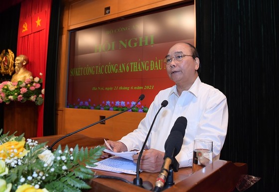 Chủ tịch nước Nguyễn Xuân Phúc: Lực lượng công an phải lo cho cuộc sống bình yên của người dân ảnh 2