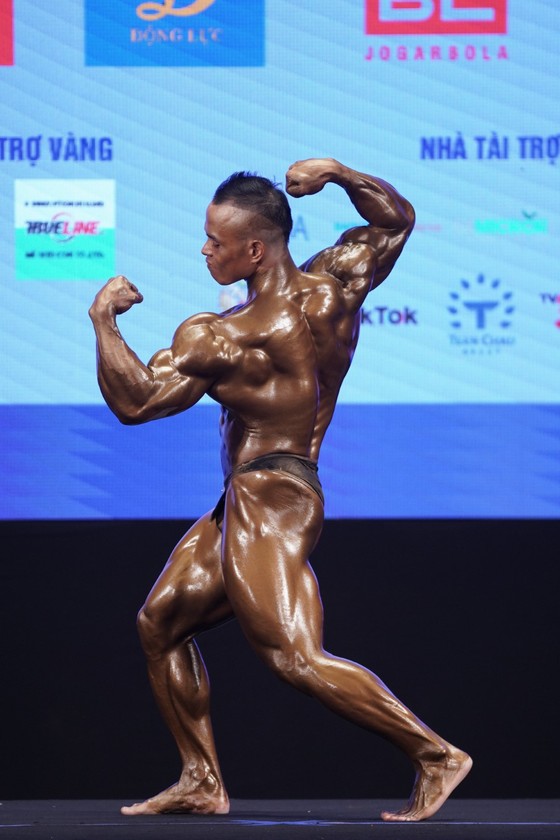 Thân hình cuồn cuộn của lực sĩ Trần Hoàng Duy Thuận vừa giành huy chương vàng ảnh 5