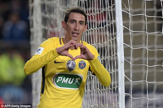 Angel Di Maria ăn mừng cú đúp vào lưới Rennes. Ảnh: Getty Images.