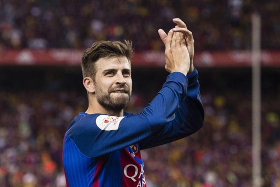 Gerard Pique muốn giải nghệ trong màu áo Barcelona. Ảnh: Getty Images.