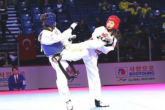 Hồ Thị Kim Ngân (giáp đỏ) là một trong những VĐV trưởng thành từ lứa tuổi trẻ của taekwondo Việt Nam. Ảnh: WTF