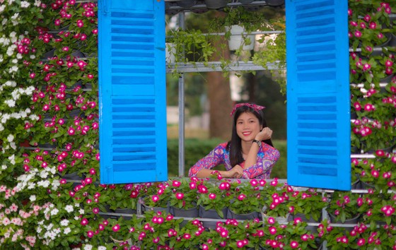 Người đẹp điền kinh Lê Thị Mộng Tuyền thướt tha trong tà áo dài truyền thống du xuân ảnh 16