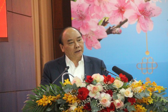 Chủ tịch nước Nguyễn Xuân Phúc trao quà Tết cho hộ nghèo, hộ khó khăn tại TP Đà Nẵng ảnh 2