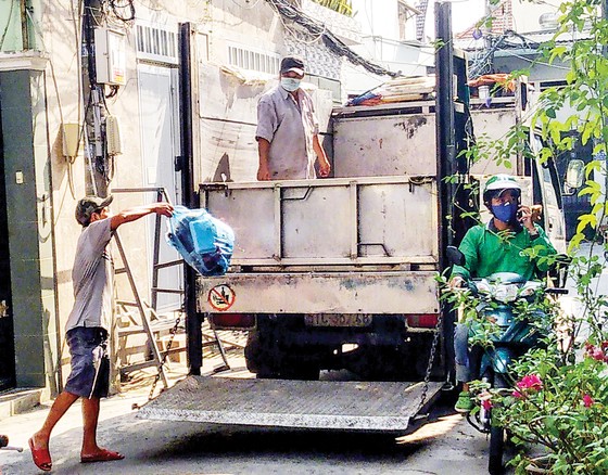 Băn khoăn... cân rác tính tiền ảnh 1