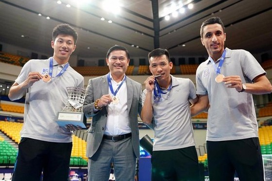Bầu Tú cùng 2 ngoại binh chất lượng đã giúp Thái Sơn Nam giành huy chương đồng cúp châu Á năm 2019. ẢNH: ANH TRẦN