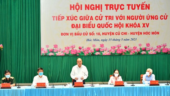Chủ tịch nước Nguyễn Xuân Phúc: Sớm có tuyến cao tốc xuyên biên giới, giúp huyện Hóc Môn và Củ Chi đột phá phát triển ảnh 2