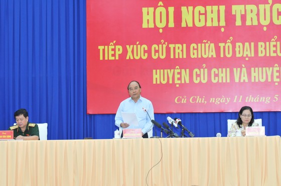 Chủ tịch nước Nguyễn Xuân Phúc: Không để sự phát triển làm người dân bần cùng hóa ảnh 4