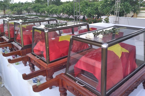 Quảng Bình: Long trọng truy điệu và an táng 16 hài cốt liệt sĩ hy sinh tại Lào ảnh 1
