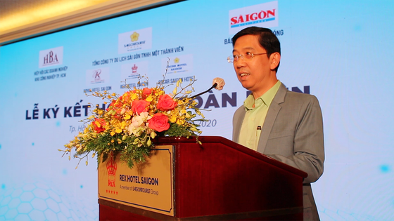 Báo SGGP và khách sạn Rex Sài Gòn đẩy mạnh hợp tác toàn diện ảnh 2