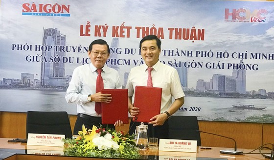 Báo Sài Gòn Giải Phóng và Sở Du lịch TPHCM ký kết hợp tác thúc đẩy phát triển du lịch TPHCM ảnh 1