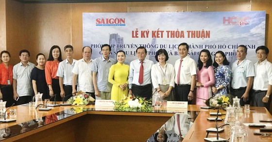 Báo Sài Gòn Giải Phóng và Sở Du lịch TPHCM ký kết hợp tác thúc đẩy phát triển du lịch TPHCM ảnh 2