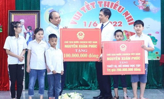 Chủ tịch nước Nguyễn Xuân Phúc: Chăm sóc trẻ em khuyết tật hòa nhập cộng đồng ảnh 2