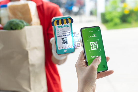 Vietcombank và SmartPay hợp tác thúc đẩy thanh toán bằng mã QR ảnh 1
