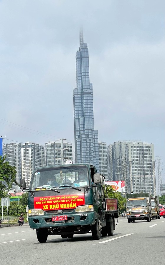 武裝力量在全市進行消毒 ảnh 1
