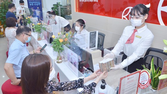 Lãi suất cho vay duy trì ở mức thấp ảnh 1