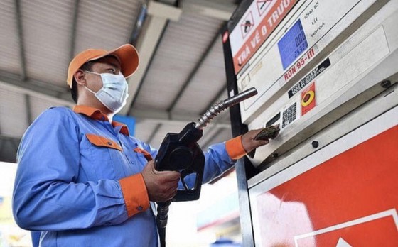 Giá xăng chiều 12-12 giảm sốc còn hơn 20.000 đồng/lít ảnh 1 Giá xăng chiều 12-12 giảm sốc còn hơn 20.000 đồng/lít ảnh 1