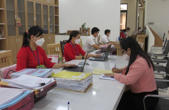 Công sở ngày đầu năm: Phục vụ nhanh, thân thiện ảnh 1 Công sở ngày đầu năm: Phục vụ nhanh, thân thiện ảnh 1