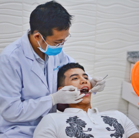 Không xem nhẹ bệnh răng miệng ảnh 1