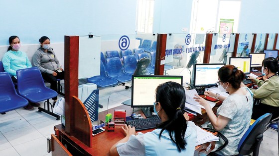 Nghịch lý dân đông, việc nhiều - cán bộ ít ảnh 1