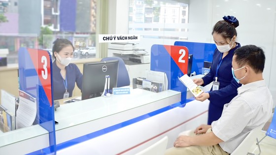 Áp lực lãi suất cho vay tăng cao ảnh 1