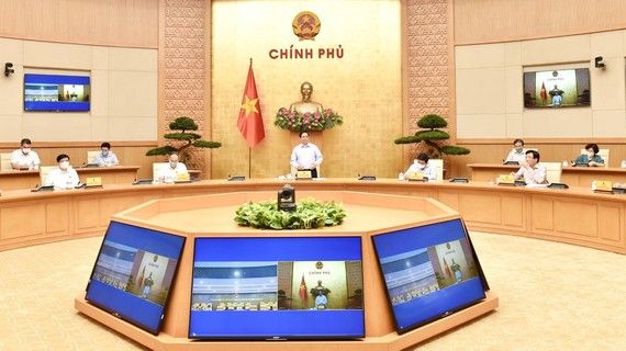 Thủ tướng Phạm Minh Chính chủ trì cuộc họp trực tuyến về việc sản xuất vaccine phòng chống Covid-19 trong nước. Ảnh: VIẾT CHUNG