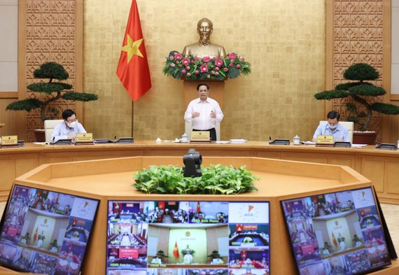 Thủ tướng Phạm Minh Chính chủ trì họp Chính phủ thường kỳ tháng 9. Ảnh: VIẾT CHUNG