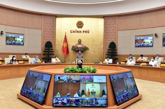 Thủ tướng Phạm Minh Chính, Trưởng Ban Chỉ đạo Quốc gia phòng, chống dịch Covid-19 chủ trì cuộc họp. Ảnh: VIẾT CHUNG