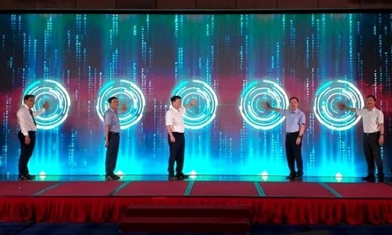 Leaders of Health MInistry and Drug Administration press button to open the data bank (Photo: SGGP)