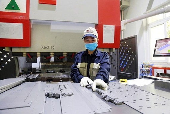 Components being produced at A Chau Industrial Technology JSC in the city's Quat Dong IC . (Photo: nhandan.com.vn)