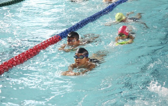 Teaching children to swim is one way to prevent drowning (Photo: SGGP0