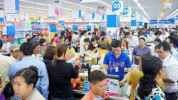 Purchase power doubles in the three-day new year holiday (Photo: SGGP)