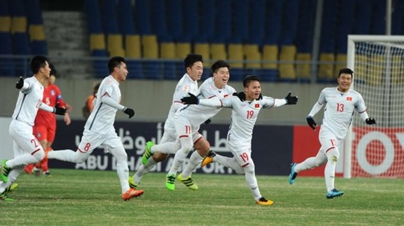 Midfielder Nguyen Quang Hai (No 19) celebrates a goal for Vietnam team in the finals of the AFC U23 Championship held in China ​on January 10. (Photo the-afc.com)