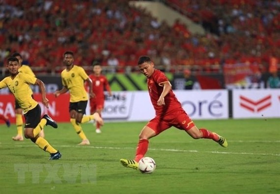 Nguyen Anh Duc scored one more goal to double Vietnam’s advantage in the match with Malaysia on November 16. (Photo: VNA)