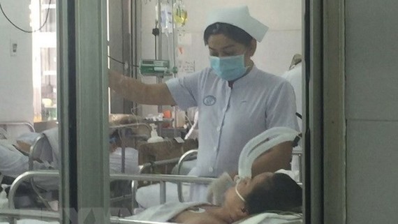 Bệnh nhân nhiễm cúm A/H1N1 điều trị tại Bệnh viện Chợ Rẫy. Ảnh: TTXVN