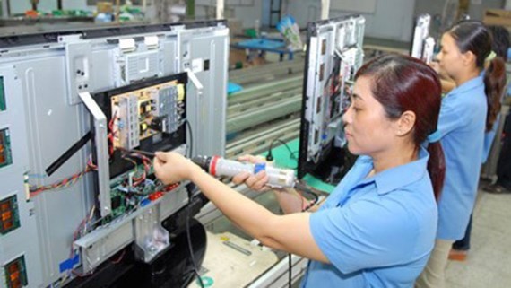 Electronics and information technology is one of four key industries posting high growth rate in the first half of 2017 (Photo: SGGP)