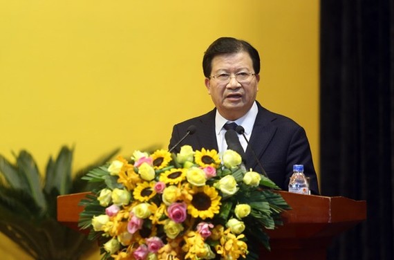 Deputy Prime Minister Trinh Dinh Dung speaks at the meeting of PetroVietnam on January 12 (Photo: VNA)