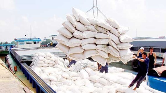 Rice bags are loaded aboard for export