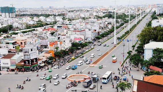 Pham Van Dong street connects Tan Son Nhat International Airport with HCMC’s eastern entrance gateway (Photo: SGGP)