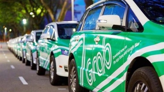 The HCMC court on Friday ordered Grab to pay US$210,300 to local taxi firm Vinasun for its violations during 2016-17, which caused losses for the Vietnamese firm. (Photo: vneconomy.vn)