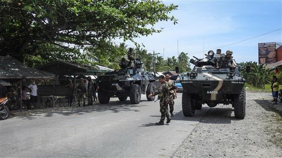 Philippine security forces patrol in Maguindanao, Mindanao island. (Photo: AFP/VNA)