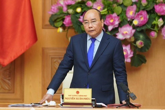 Prime Minister Nguyen Xuan Phuc on February 1 signed Decision No.173.QD-TTg, declaring the acute respiratory disease caused by the new coronavirus (nCoV) an epidemic in Vietnam. (Photo: VNA)