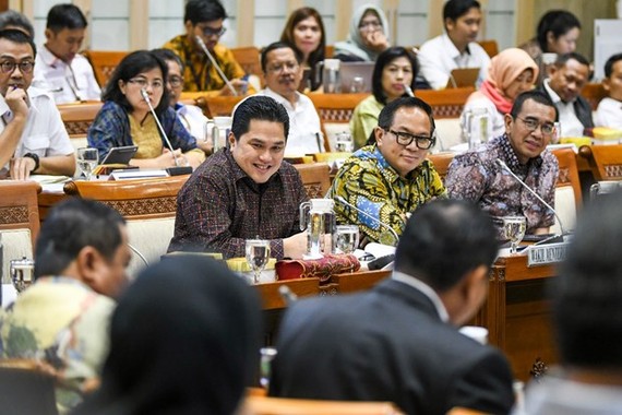 Indonesia's State-Owned Enterprises (SOEs) Minister Erick Thohir (front, left) sits with deputy minister Kartika Tiko Wirjoatmodjo (center) (Source: www.thejakartapost.com)