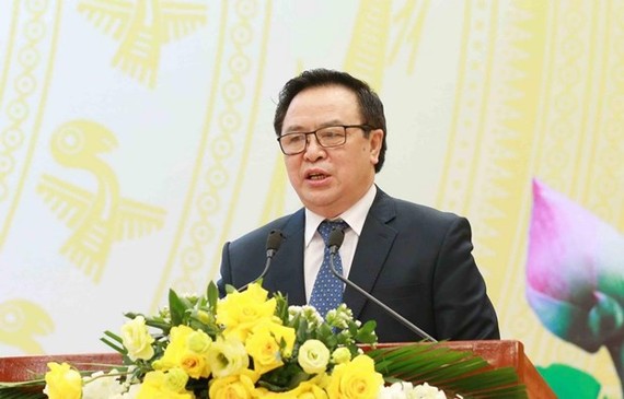 Hoang Binh Quan, Chairman of the Party Central Committee’s Commission for External Relations, speaks at the meeting in Hanoi on February 3 (Photo: VNA)