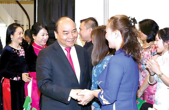 Thủ tướng Nguyễn Xuân Phúc và phu nhân gặp gỡ cộng đồng người Việt Nam tại Na Uy. Ảnh:TTXVN