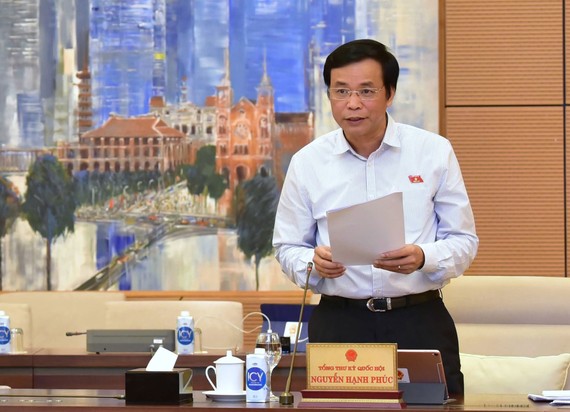 Tổng Thư ký Quốc hội Nguyễn Hạnh Phúc  phát biểu tại phiên họp. Ảnh: QUANG PHÚC