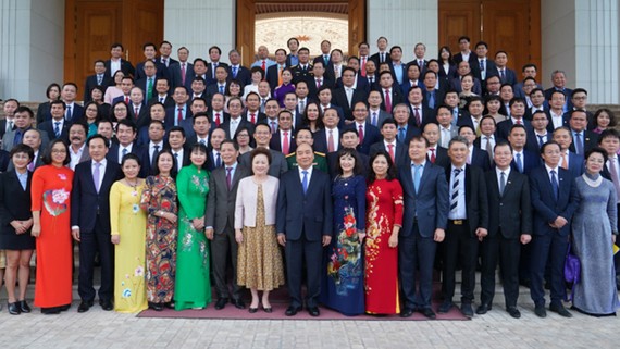 Thủ tướng Chính phủ gặp mặt 124 doanh nghiệp có sản phẩm đạt Thương hiệu Quốc gia năm 2020. Ảnh: VGP